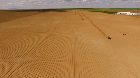 Tractors Run Parallel Plowing For New Planting Farm Agriculture Video stock 87273870