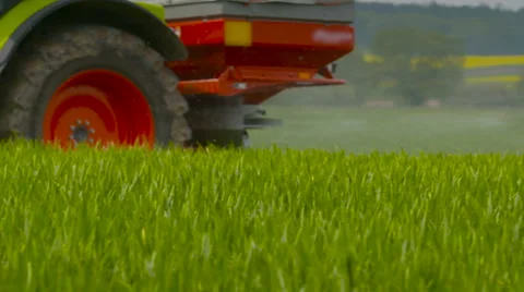 Tractors sprayed with fertilizer Stock Footage 63951438