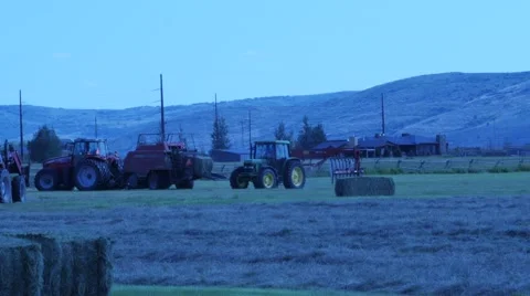 Tractors working on a farm. Stock Footage 56337139
