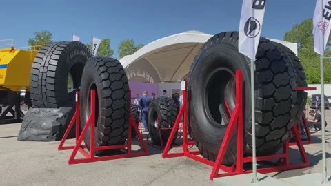 Trade Fair for Coal Mining Technology. Giant car tires Belshina. Stock Footage 155802755