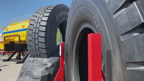 Trade Fair for Coal Mining Technology. Giant car tires Belshina. Stock Footage 155802760