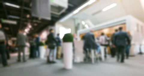 Trade fair generic background. Intentionally blurred post production. Humans Stock Photos