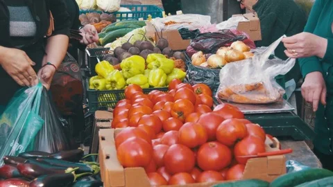 Trade, the Seller Sells Vegetables and Fruits on the Counter of the Spontaneous Stock Footage