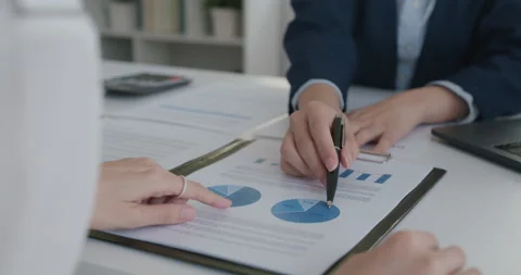 Trader agent financial advisor explain client in insurance contract. Stock Footage 160315577