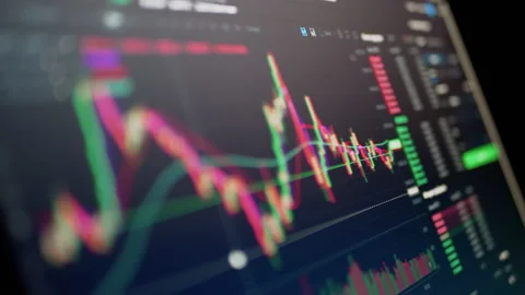 Trader Analyzes Candlestick Chart of Movement of Cryptocurrency on Screen PC Video stock 170626401