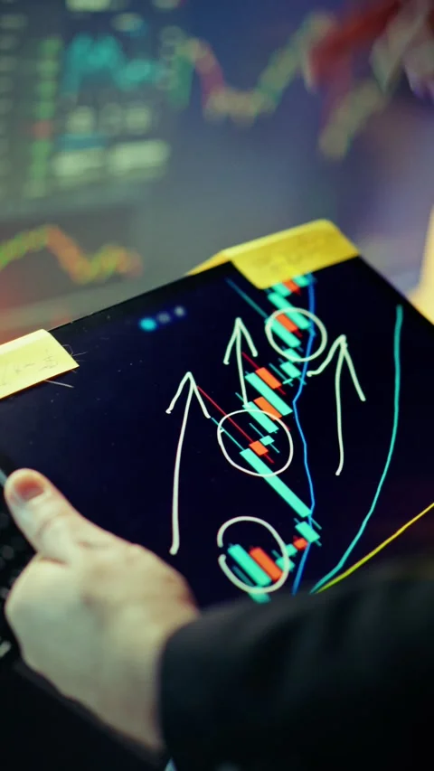 Trader Analyzing Crypto Stock Chart With Hand Drawn Up Arrows On Tablet 動画素材 346401380