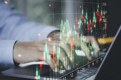 Trader businessman using laptop computer to analysis virtual technical stock Stock Photos