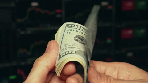Trader checking and counting dollar banknotes Stock Footage 140951120