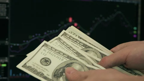 Trader Counting Dollars Banknotes Watching Stock Exchange Chart Stock Footage 139791045