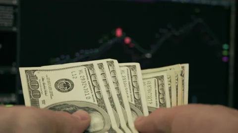 Trader Counting Dollars Banknotes Watching Stock Exchange Chart Stock Footage 139841121