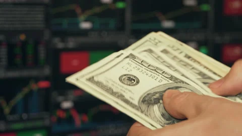 Trader Counting Dollars Banknotes Watching Stock Exchange Chart Stock Footage 140948039
