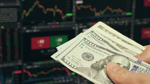 Trader Counting Dollars Banknotes Watching Stock Exchange Chart Stock Footage 141091395