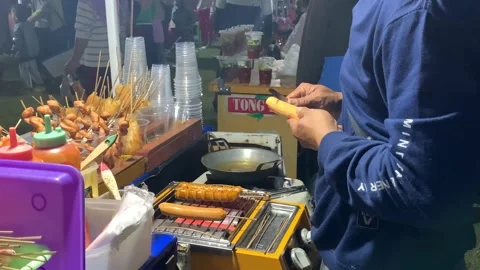 The trader is cutting sausages Stock Footage 254014508