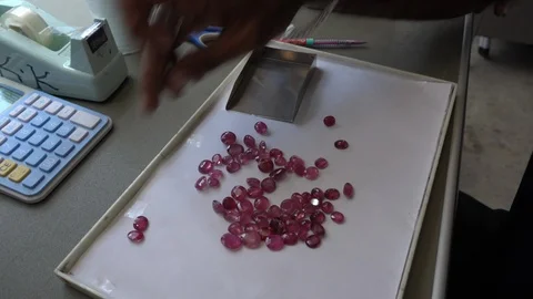 A trader displays gemstone or crystal in the trading market THAILAND. Stock-Footage 95773754