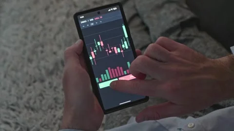 Trader Gets Financial Loss Notification on Short Position in Mobile App Stock Footage 341568928