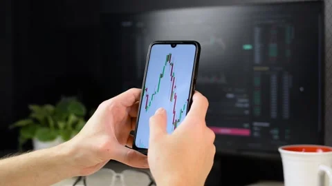 Trader investor using mobile app to analyze stock exchange chart Видео 166431779