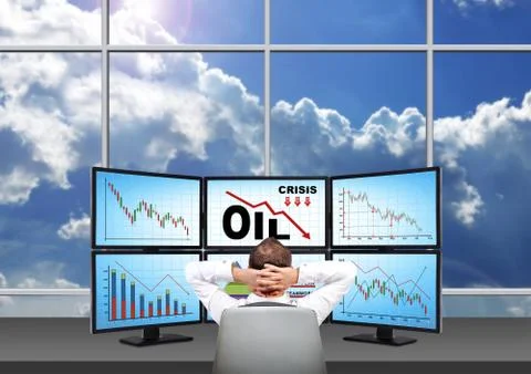 Trader looking on statistics fall in oil prices Foto stock