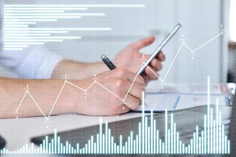 Trader man with smartphone analyzing at data Stock Photos