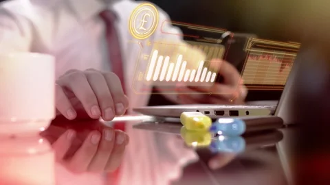 The trader monitors the fall of the pound sterling. Stock Footage 248640721