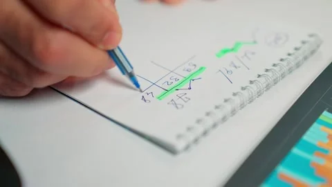 A trader trades bitcoin on the exchange. A businessman negotiates with partners. 動画素材 302194553