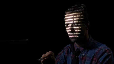 Trader using his home computer at night to access blockchain servers data tha Stock Footage 86451899