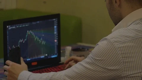 Trader at work. bitcoin trade Stock Footage 84780765
