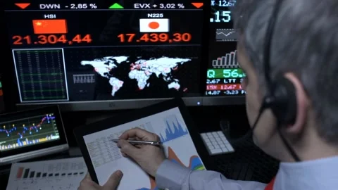 Trader working on data Stock Footage 200137046