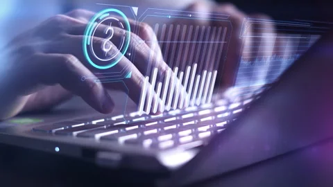 Trader working on laptop with dollar rate charts. Stock Footage 258278054