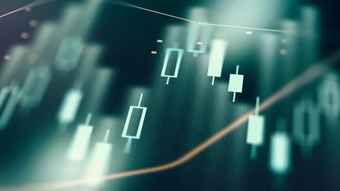 Traders analyze charts and graphs for market trends during active trading hours Stock Photos