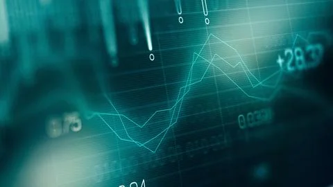 Traders analyze data on charts to make informed decisions in stock market Stock Photos