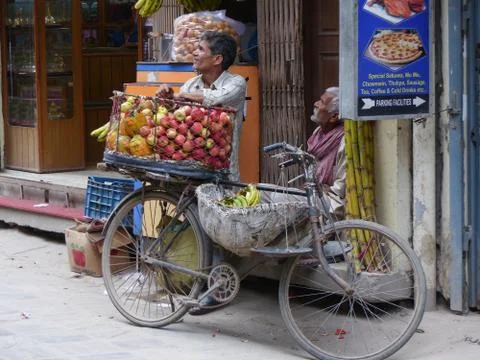 Traders with bicycle sell the fruit 写真素材
