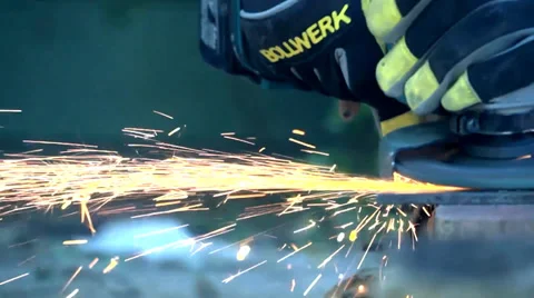 Tradesman using a grinder in Slomo Stock Footage 35769683