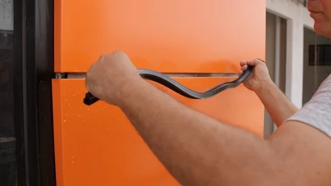 Tradesman working installing silicone extrusion Stock Footage 104228900