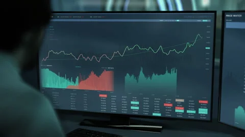 Trading profitable stocks using the futuristic online financial banking software Stock Footage 278173666