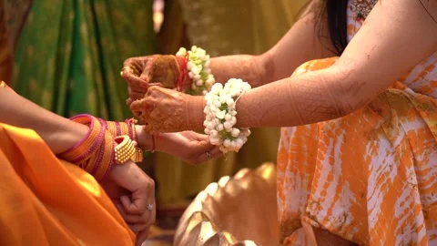 The Tradition of Kalava Binding During Haldi Stock Footage 265133658