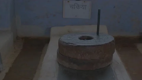 Tradition old stone hand flour mills in india Stock Footage 226123893
