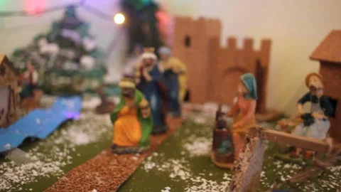 The tradition of setting up the Nativity scene at home for Christmas Stock Footage 324682147