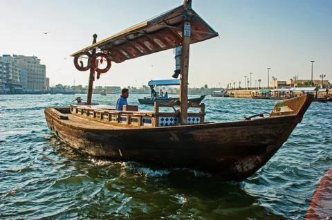 Traditional abra ferries at the creek in dubai Stock Photos