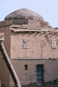 A Traditional Adobe Structure with a Distinctive Dome Roof Amidst a Clear Sky Stock Photos