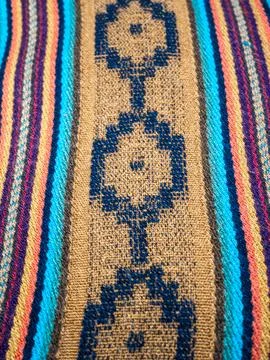 Traditional Andean woven textile pattern close up at Otavalo Market Ecuador Stock Photos