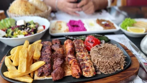 Traditional Arabic Mixed Grill Platter and Appetizers Stock Footage 336356314