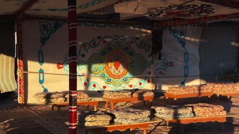 Traditional Arabic Ornamental Pattern on Bedouin Tent Wall Illuminated by Stock Footage 341839021