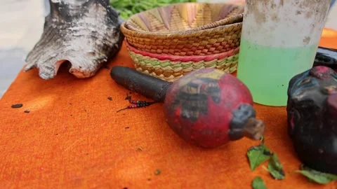 Traditional Aztec Ritual Artifacts Rattle Basket Conch Shell Herbs Mexico Video stock 344627465