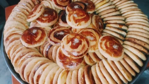 Traditional Baked Local Biscuits Arranged Neatly In A Large Tray Stock Footage 345943576
