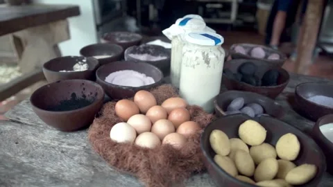 Traditional baking ingredients arranged on rustic kitchen table in Mexico Stock Footage 335354011