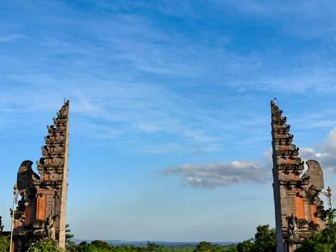 Traditional Balinese Candi Bentar Split Gate with Blue Sky Background Stock Photos