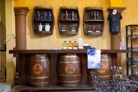 Traditional bar setup inside a rustic Mexican tequila house for tastings and Stock Photos