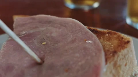Traditional Basque pintxo with ham and toasted bread Stock-Footage 342199871
