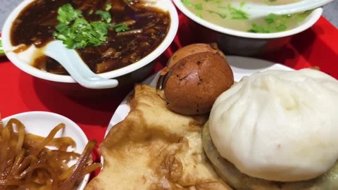 Traditional Beijing Breakfast Selection in Local Restaurant Stock Footage 339435362