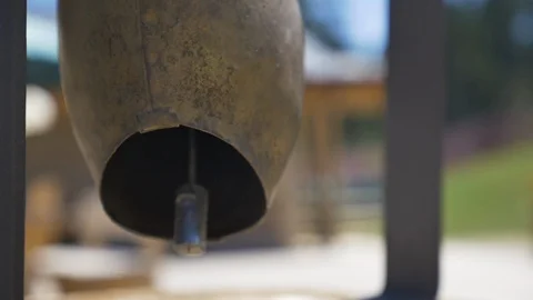 Traditional bell ringing in temple Stock Footage 106203031